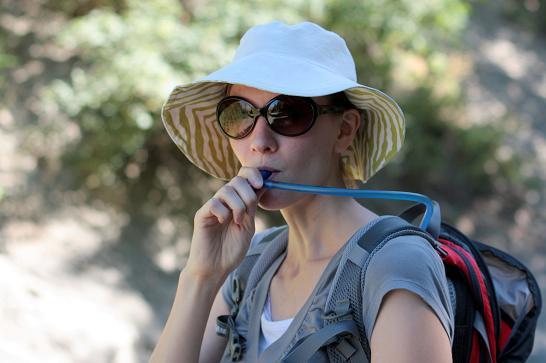 Woman with hydration pack.