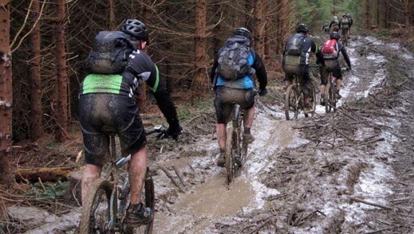 Bikers with hydration packs.